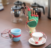 Galvanic skin response measuring cups and glove.